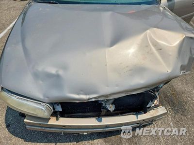 Zdjęcie 11 z 12 samochodu: 2002 BUICK CENTURY LIMITED VIN:2G4WY55J021279681 - miniatura