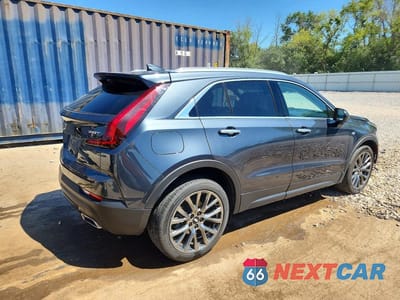 Trzecie zdjęcie samochodu z tyłu: 2021 CADILLAC XT4 LUXURY VIN:1GYFZBR41MF026220 - miniatura
