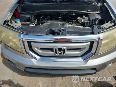 Zdjęcie 12 z 13 samochodu: 2010 HONDA PILOT EXL VIN:5FNYF3H5XAB004210 - miniatura