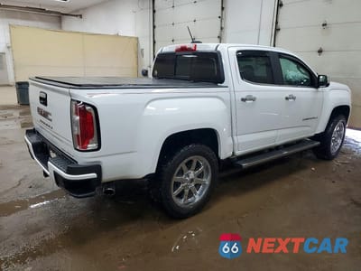 Trzecie zdjęcie samochodu z tyłu: 2022 GMC CANYON DENALI VIN:1GTG6EEN3N1140799 - miniatura