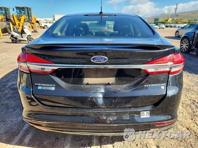 Zdjęcie 6 z 12 samochodu: 2017 FORD FUSION TITANIUM PHEV VIN:3FA6P0SU6HR191642 - miniatura