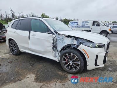 Czwarte zdjęcie samochodu z boku: 2026 BMW X5 XDRIVE40I VIN:5UX23EU04T9307502 - miniatura