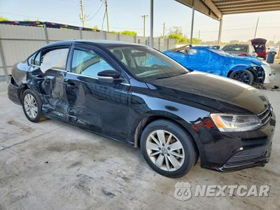 Czwarte zdjęcie samochodu z boku: 2015 VOLKSWAGEN JETTA SE VIN:3VWD07AJ0FM304367 - miniatura