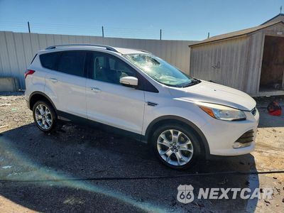Czwarte zdjęcie samochodu z boku: 2014 FORD ESCAPE TITANIUM VIN:1FMCU0J91EUC99394 - miniatura