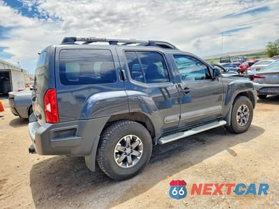 Trzecie zdjęcie samochodu z tyłu: 2014 NISSAN XTERRA PRO-4X VIN:5N1AN0NW9EN807576 - miniatura