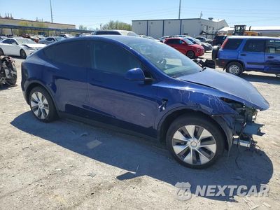 Czwarte zdjęcie samochodu z boku: 2022 TESLA MODEL Y VIN:7SAYGDEE9NF559505 - miniatura