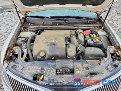 Zdjęcie 11 z 12 samochodu: 2013 LINCOLN MKS VIN:1LNHL9DK7DG610349 - miniatura
