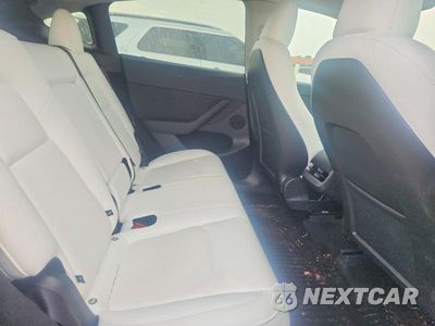 Zdjęcie 10 z 12 samochodu: 2025 TESLA MODEL Y VIN:7SAYGDED0SF232882 - miniatura