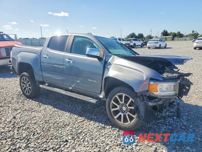Czwarte zdjęcie samochodu z boku: 2019 GMC CANYON DENALI VIN:1GTG6EEN0K1345301 - miniatura