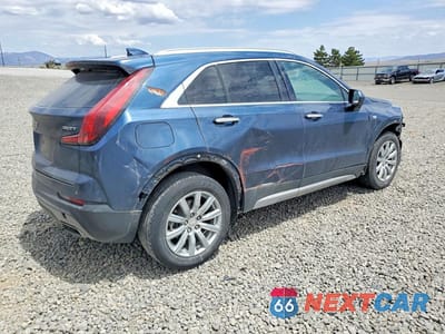 Trzecie zdjęcie samochodu z tyłu: 2019 CADILLAC XT4 PREMIUM LUXURY VIN:1GYFZCR47KF106897 - miniatura