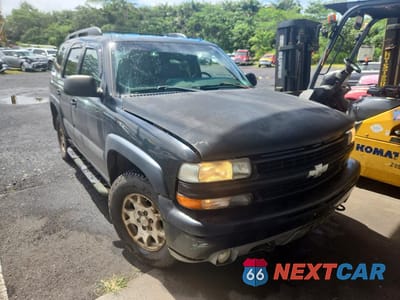Czwarte zdjęcie samochodu z boku: 2002 CHEVROLET TAHOE K1500 VIN:1GNEK13Z52R235578 - miniatura