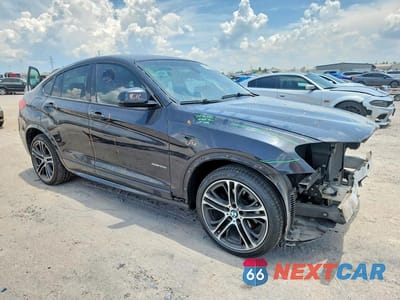 Czwarte zdjęcie samochodu z boku: 2016 BMW X4 XDRIVE28I VIN:5UXXW3C50G0R19009 - miniatura