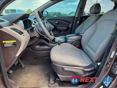 Zdjęcie 7 z 13 samochodu: 2014 HYUNDAI TUCSON GLS VIN:KM8JT3AFXEU850357 - miniatura