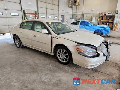 Czwarte zdjęcie samochodu z boku: 2011 BUICK LUCERNE CX VIN:1G4HA5EM2BU121869 - miniatura
