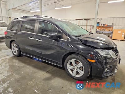 Czwarte zdjęcie samochodu z boku: 2018 HONDA ODYSSEY EXL VIN:5FNRL6H77JB032241 - miniatura