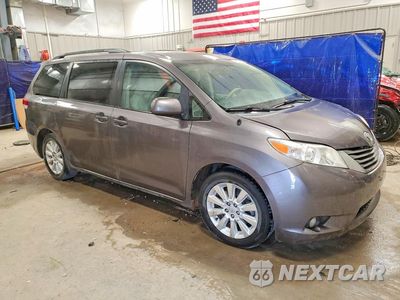 Czwarte zdjęcie samochodu z boku: 2014 TOYOTA SIENNA XLE 7-PASSENGER VIN:5TDDK3DC6ES084086 - miniatura