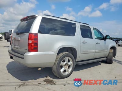 Trzecie zdjęcie samochodu z tyłu: 2011 CHEVROLET SUBURBAN K1500 LT VIN:1GNSKJE35BR336180 - miniatura