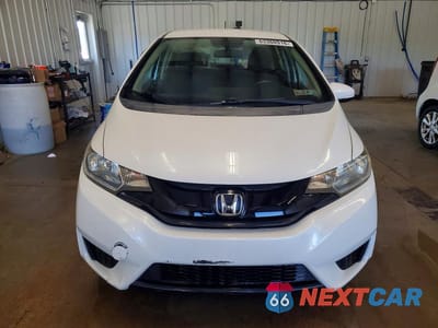Piąte zdjęcie samochodu w środku: 2016 HONDA FIT LX VIN:JHMGK5H59GS013834 - miniatura