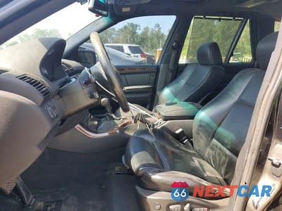 Zdjęcie 7 z 13 samochodu: 2002 BMW X5 4.6IS VIN:5UXFB93552LN78353 - miniatura