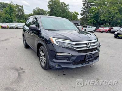 Czwarte zdjęcie samochodu z boku: 2016 HONDA PILOT EXL VIN:5FNYF6H50GB053393 - miniatura