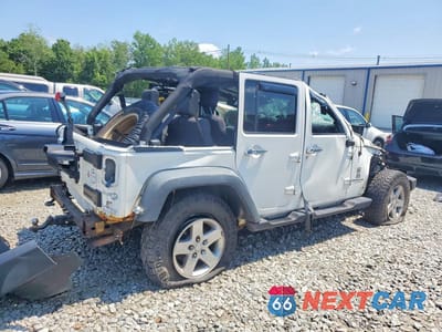 Trzecie zdjęcie samochodu z tyłu: 2010 JEEP WRANGLER UNLIMITED SPORT VIN:1J4BA3H11AL159396 - miniatura