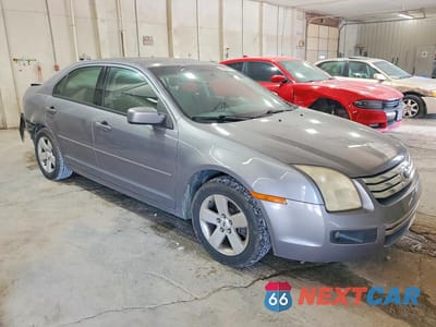 Czwarte zdjęcie samochodu z boku: 2006 FORD FUSION SE VIN:3FAFP07136R220851 - miniatura