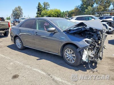 Czwarte zdjęcie samochodu z boku: 2014 TOYOTA CAMRY HYBRID LE VIN:4T1BD1FK6EU111658 - miniatura