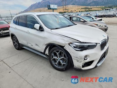 Czwarte zdjęcie samochodu z boku: 2018 BMW X1 XDRIVE28I VIN:WBXHT3C30J3H31809 - miniatura