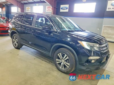 Czwarte zdjęcie samochodu z boku: 2018 HONDA PILOT EXL VIN:5FNYF6H59JB057935 - miniatura