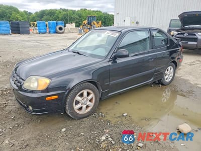 2004 HYUNDAI ACCENT GL KMHCG35C04U303951 - główne zdjęcie licytacji z USA - miniatura