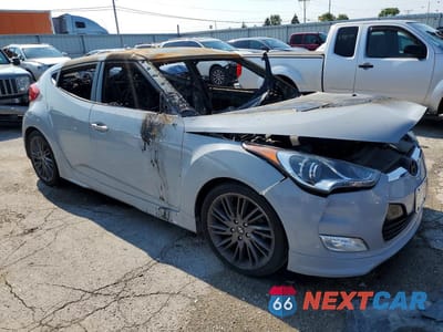 Czwarte zdjęcie samochodu z boku: 2013 HYUNDAI VELOSTER RE MIX VIN:KMHTC6ADXDU128247 - miniatura