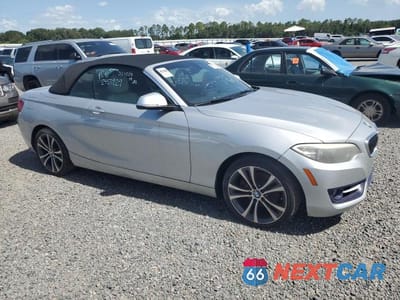 Czwarte zdjęcie samochodu z boku: 2016 BMW 228 I SULEV VIN:WBA1K9C5XGV321550 - miniatura
