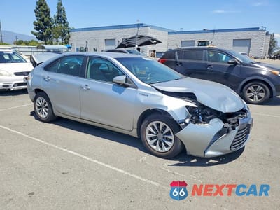 Czwarte zdjęcie samochodu z boku: 2017 TOYOTA CAMRY HYBRID LE VIN:4T1BD1FK1HU213518 - miniatura