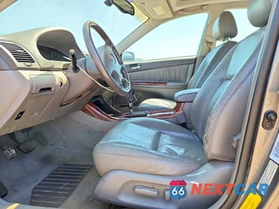 Zdjęcie 7 z 12 samochodu: 2002 TOYOTA CAMRY XLE V6 VIN:4T1BF30K32U526902 - miniatura