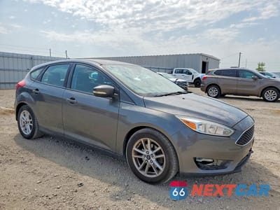 Czwarte zdjęcie samochodu z boku: 2016 FORD FOCUS SE VIN:1FADP3K24GL245475 - miniatura