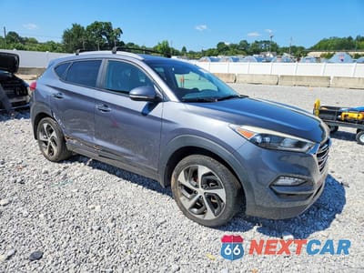 Czwarte zdjęcie samochodu z boku: 2016 HYUNDAI TUCSON LIMITED VIN:KM8J3CA2XGU251698 - miniatura