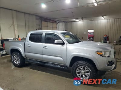 Czwarte zdjęcie samochodu z boku: 2017 TOYOTA TACOMA SR5 V6 VIN:5TFCZ5AN7HX093211 - miniatura