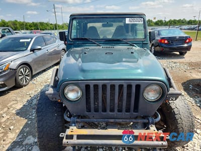 Piąte zdjęcie samochodu w środku: 2000 JEEP WRANGLER / TJ SPORT VIN:1J4FA49S7YP712148 - miniatura