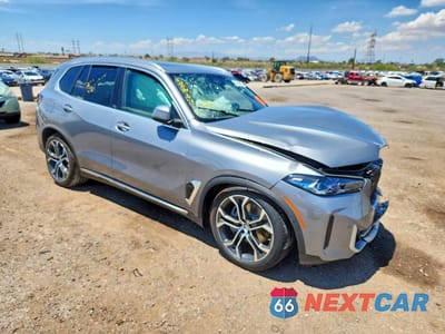 Czwarte zdjęcie samochodu z boku: 2026 BMW X5 XDRIVE50E VIN:5UX43EU08T9458934 - miniatura