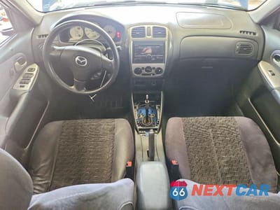 Zdjęcie 8 z 12 samochodu: 2003 MAZDA PROTEGE DX VIN:JM1BJ225231158946 - miniatura