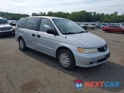 Czwarte zdjęcie samochodu z boku: 2002 HONDA ODYSSEY LX VIN:2HKRL18562H549177 - miniatura