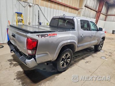 Trzecie zdjęcie samochodu z tyłu: 2018 TOYOTA TACOMA TRD SPORT VIN:5TFCZ5AN0JX142867 - miniatura