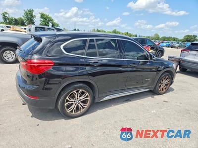 Trzecie zdjęcie samochodu z tyłu: 2017 BMW X1 XDRIVE28I VIN:WBXHT3Z37H4A53653 - miniatura