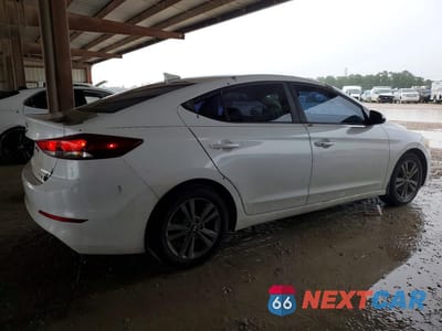 Trzecie zdjęcie samochodu z tyłu: 2018 HYUNDAI ELANTRA VALUE EDITION VIN:5NPD84LF2JH221797 - miniatura