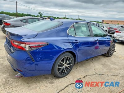 Trzecie zdjęcie samochodu z tyłu: 2024 TOYOTA CAMRY HYBRID SE VIN:4T1G31AK3RU067740 - miniatura