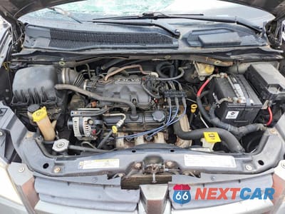 Zdjęcie 12 z 13 samochodu: 2010 DODGE GRAND CARAVAN SE VIN:2D4RN4DE2AR362881 - miniatura