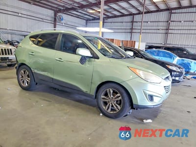 Czwarte zdjęcie samochodu z boku: 2011 HYUNDAI TUCSON GLS VIN:KM8JU3AC9BU232056 - miniatura