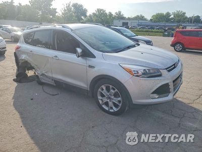 Czwarte zdjęcie samochodu z boku: 2016 FORD ESCAPE TITANIUM VIN:1FMCU9J90GUC26766 - miniatura