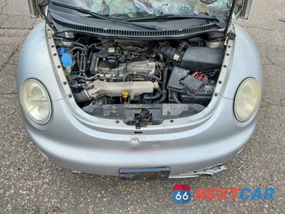 Zdjęcie 11 z 12 samochodu: 2001 VOLKSWAGEN NEW BEETLE GLX VIN:3VWDC21C41M402757 - miniatura