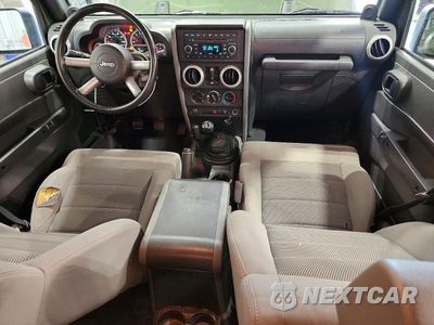 Zdjęcie 8 z 13 samochodu: 2008 JEEP WRANGLER UNLIMITED SAHARA VIN:1J4GA59108L521440 - miniatura